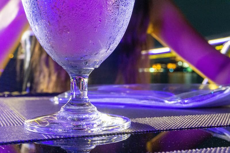 glass of wine on the chao phraya dinner cruise