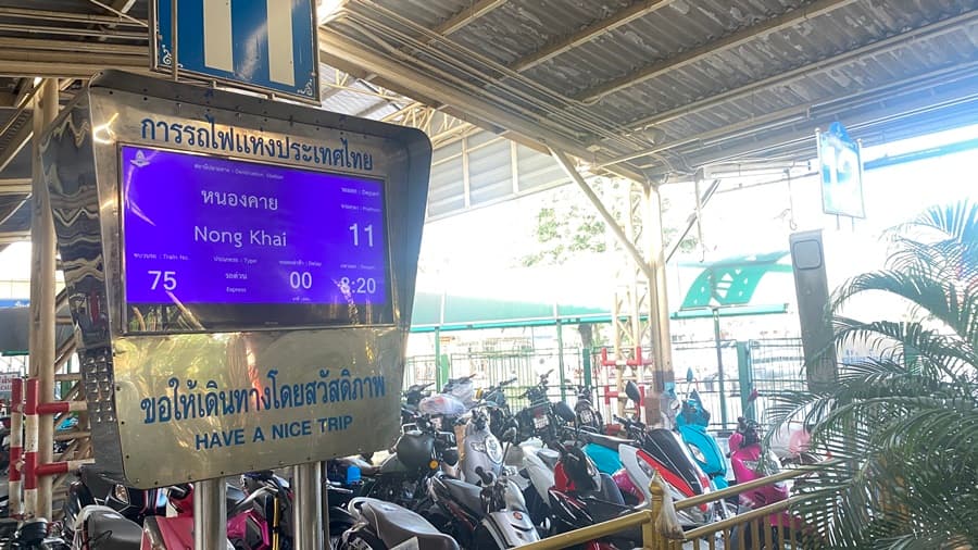 train departure board at bangkok station with information about train to nong khai