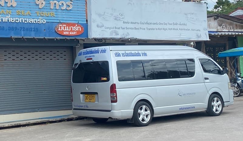 minibus from Koh Lanta to Khao Sok Parked on Street in Thailand