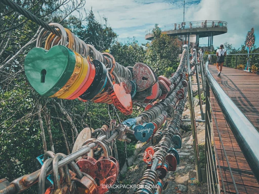 Lock locks. The Langkawi skybridge has hundreds of colored heat shaped padlocks attached to the railing