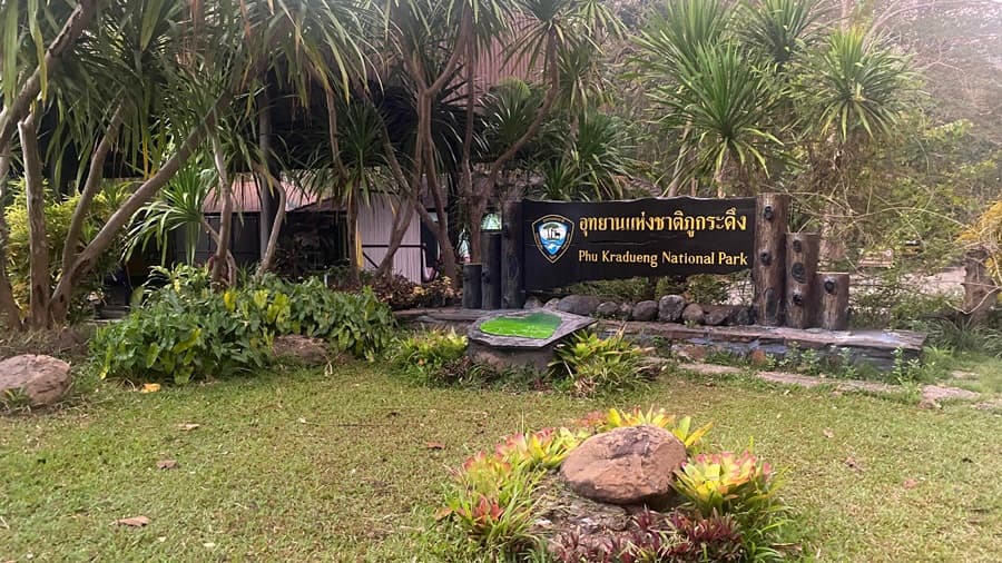 Caming In Thaialnd Entrance to Phu Kradueng Mountail Trail National Park Sign