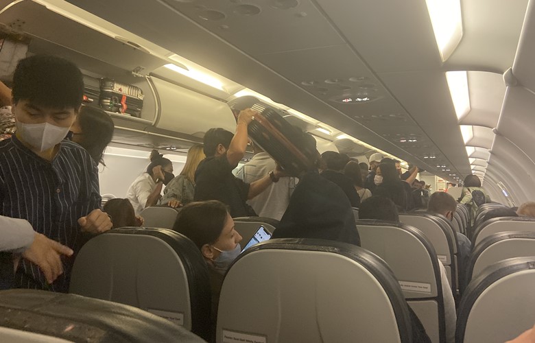 passengers on airplane during coronavirus flught pandemic 1