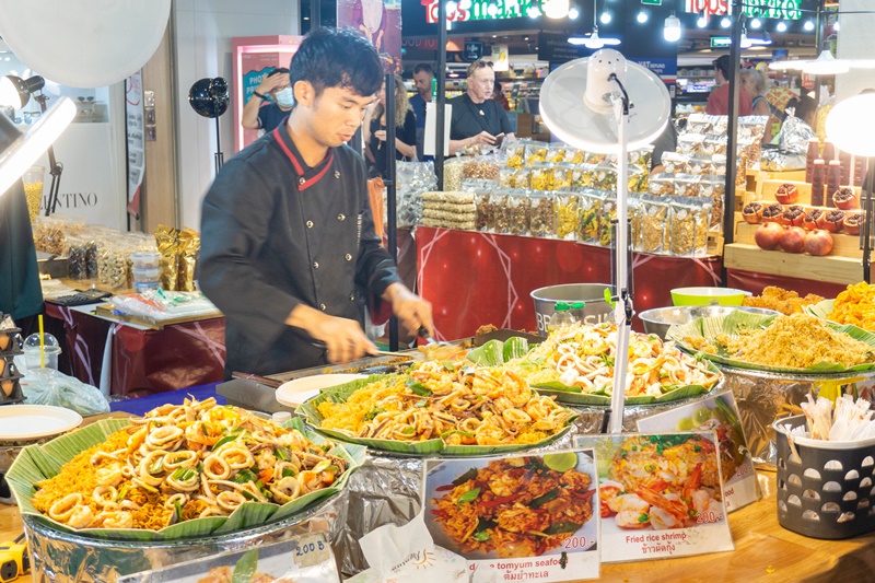 MBK Food Vendors Cooking Pad Thai on the Ground Floor of the Bangkok Shoppin Mall