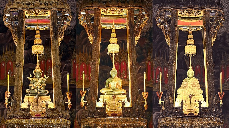 emerald buddha in the Bangkok Temple Wat Phra Kaew showing diffent outfits worn throughout the year at the bangkok temple