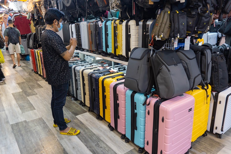 suitcase sales man at the MBK Center in Bangkok