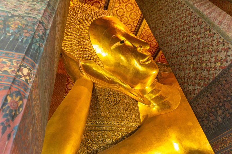 the famous wat pho temple in bangkok with the sleeping buddha statue
