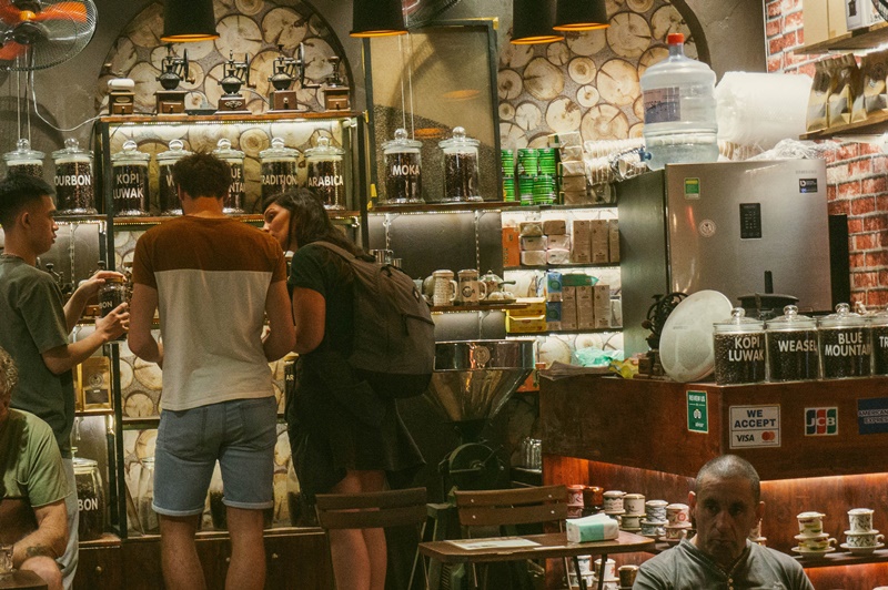 a hanoi coffe shop selling local coffee beans to tourists weasel coffee from hanoi vietnam