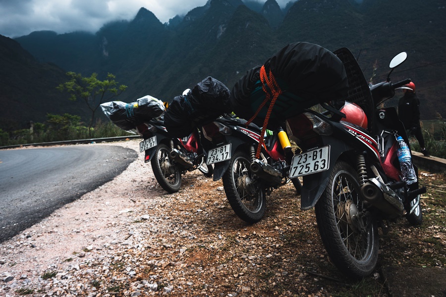 a trio of motorcycles rented in ha giang to ride the ha giang loop in vietnam where to rent bikes from