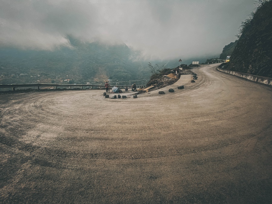 hairpin bend on winding mountain track in the ha giang loop