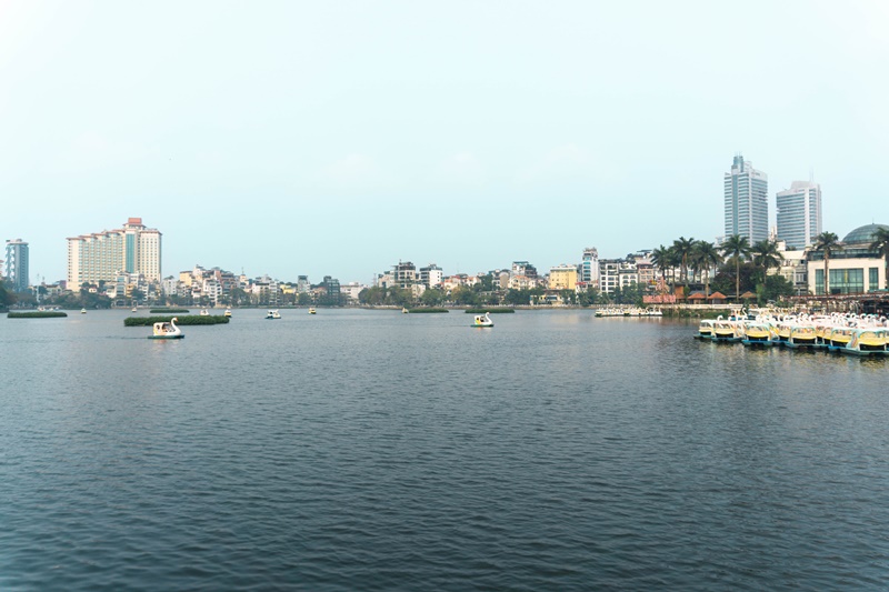 swan boats on west lake in hanoi