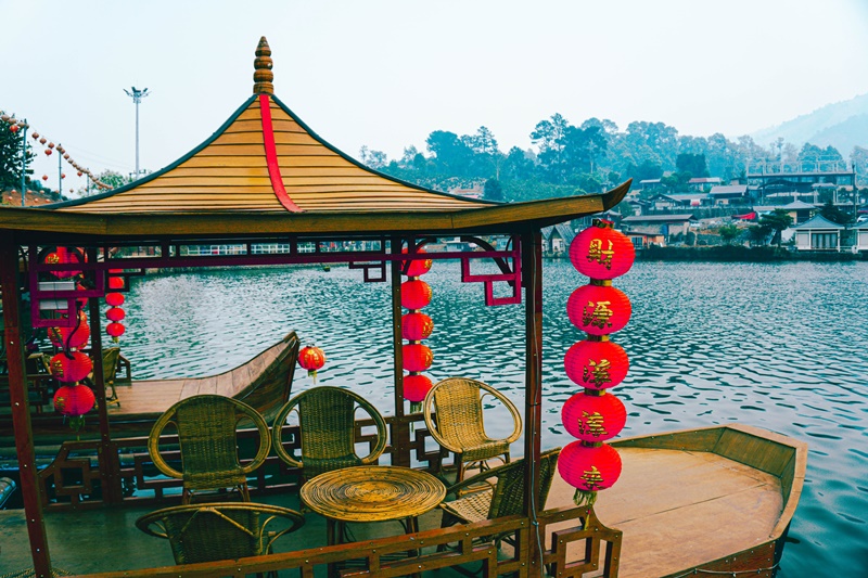 a boat on the lake in mae hong son loop chinese village