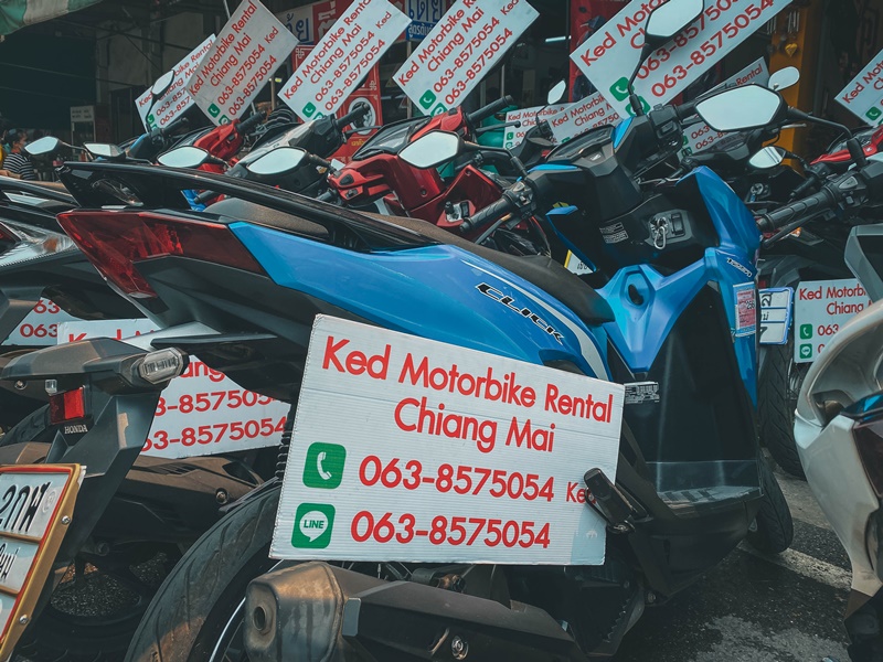 motorbikes parked outside chiang mai motorcycle rental shop