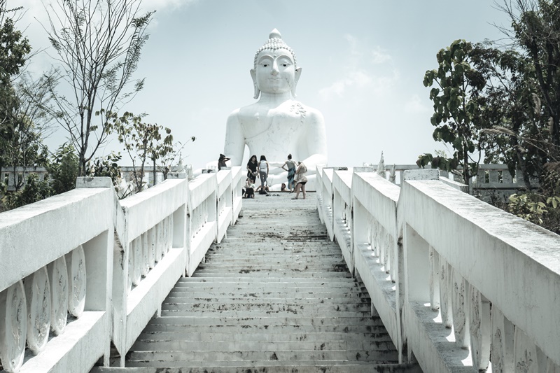 photo of the pai big buddha with staircase leading to the top