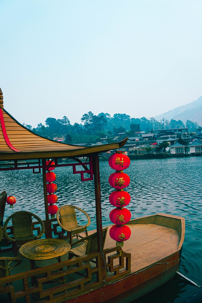 ban rak thai tour boat with chinese lantern on lake