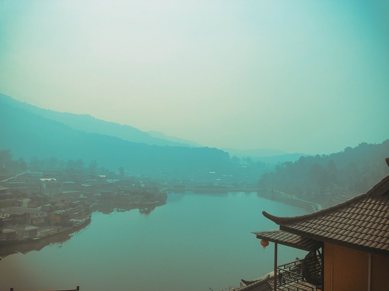 fog lifting from ban rak thai lake things to do and see at sunrise