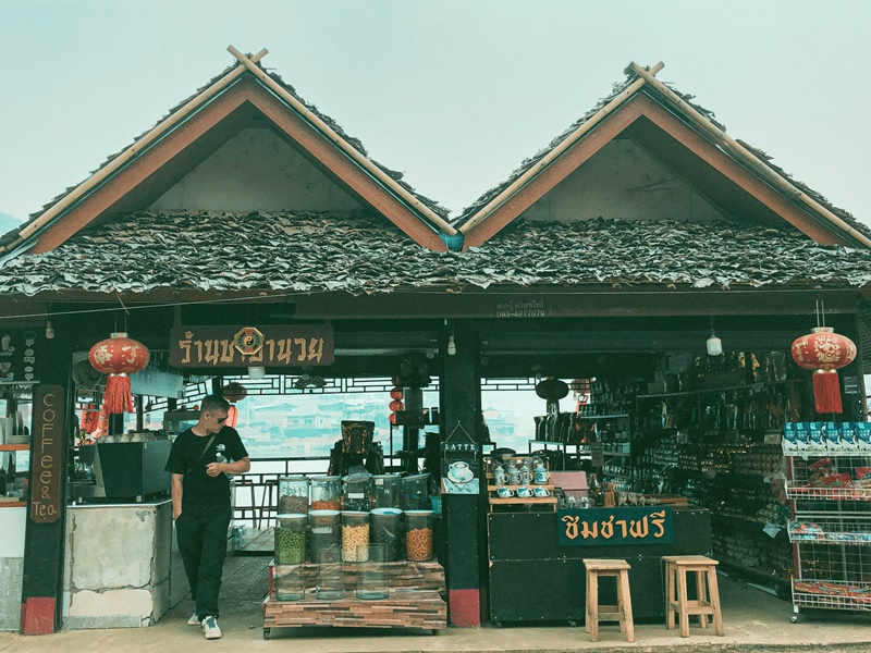 tourist visits tea tasting and souvineer shop in ban rak thai