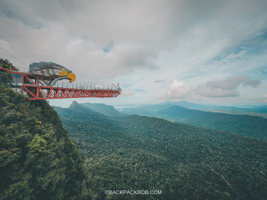 Glass bottomed eagle skywalk at langkawi skycab middle station. Suspension bridge with viewing platform and eagle design. New attraction set to open in 2024