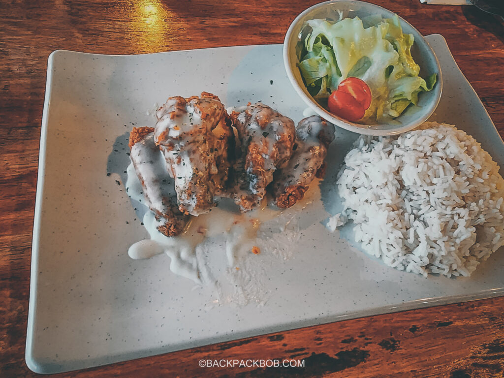 food in Langkawi plate of Malaysian Korean inspired sticky chicken garlic wings at local Langkawi restaurant