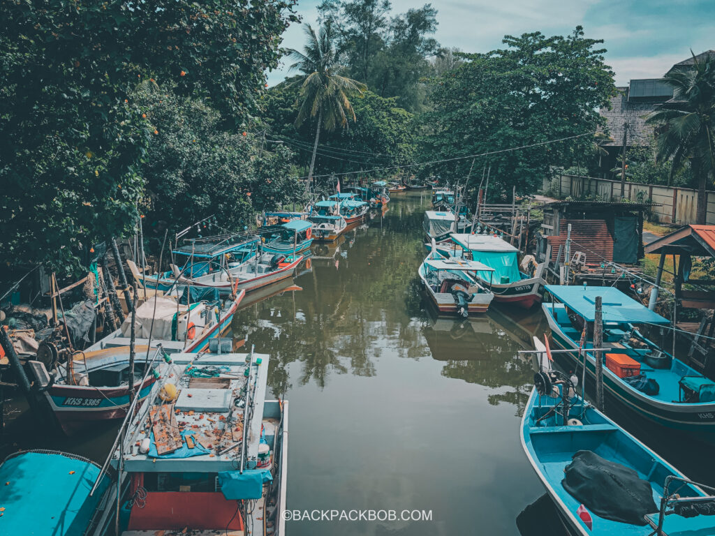photo of river in langkawi island with local fishing boats