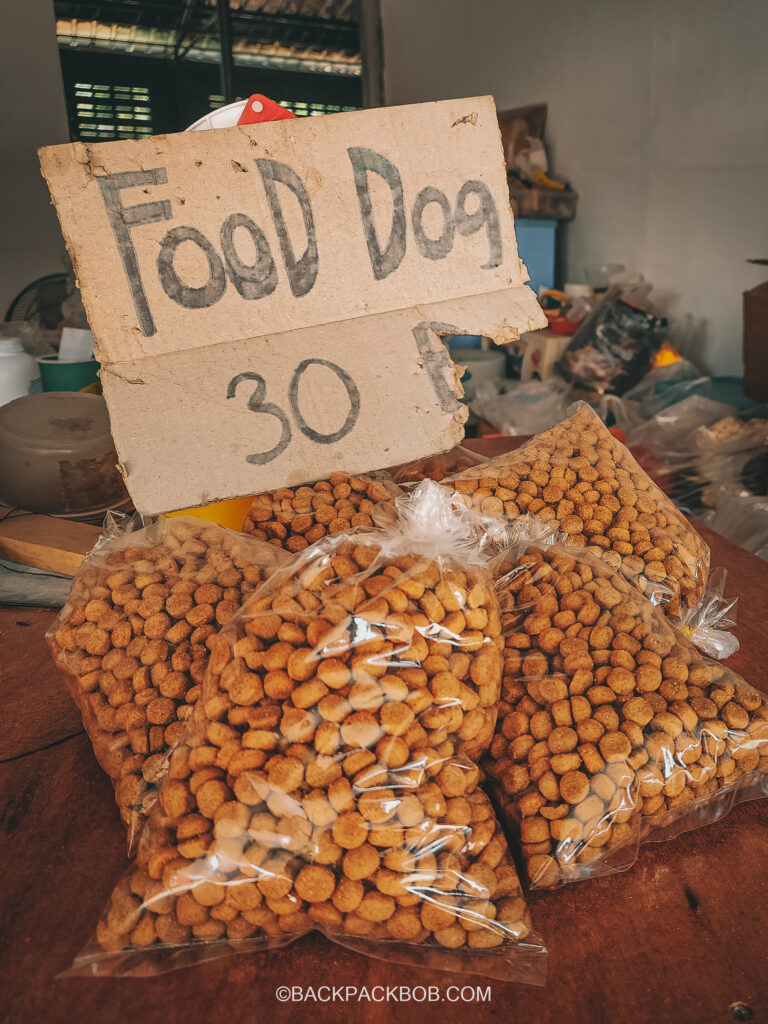 Bags of dog food are sold for the animals on Koh Mook