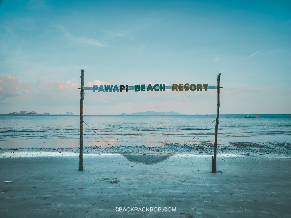 Sign and swing on the beach of Pawapi Beach Resort in Koh Mook