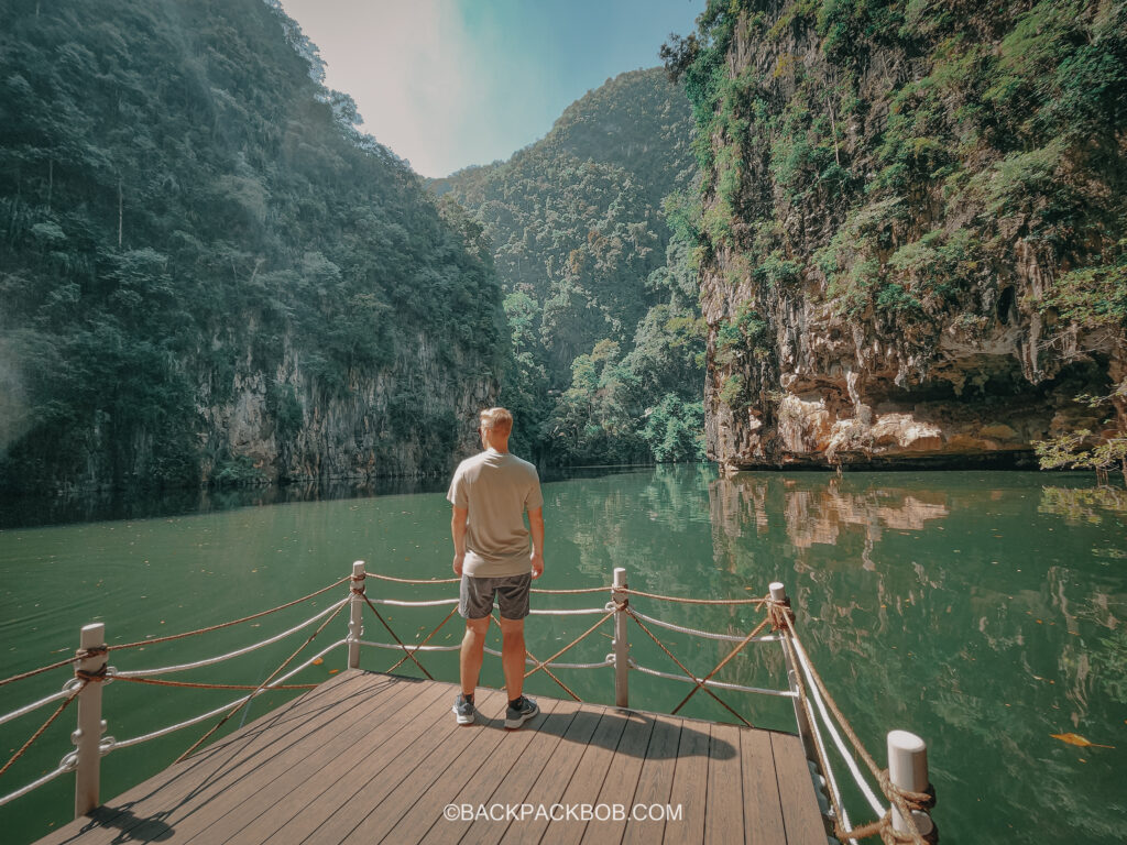 backpack bob is taking a photo at Mirror Lake, tasik Cermin in Ipoh