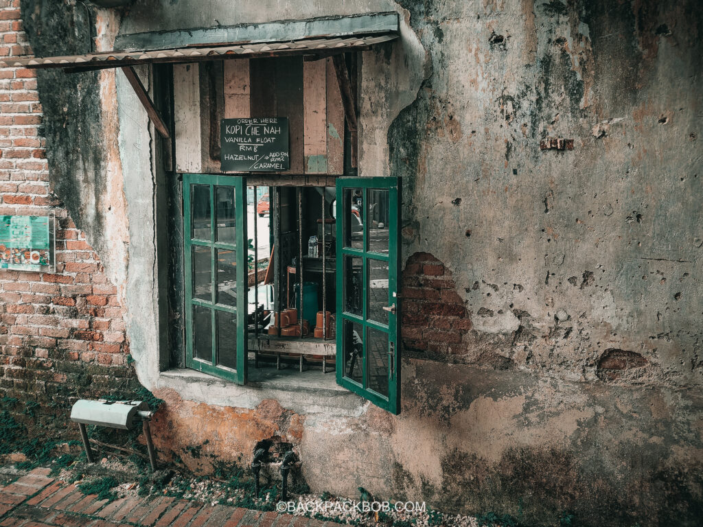 A coffee shop in Ipoh has a window to serve customers on the street - Ipoh