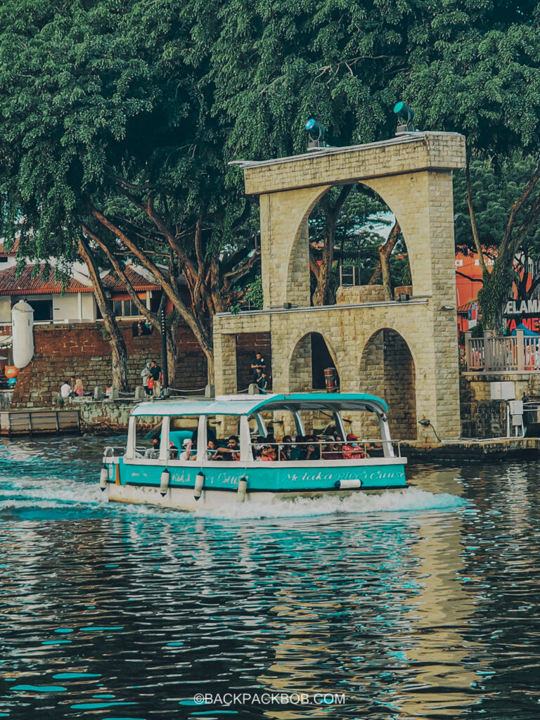 A photo of the Melaka River Malaysia itinerary the boat cruises along the river carrying tourist passengers on a tour Melaka River Cruise