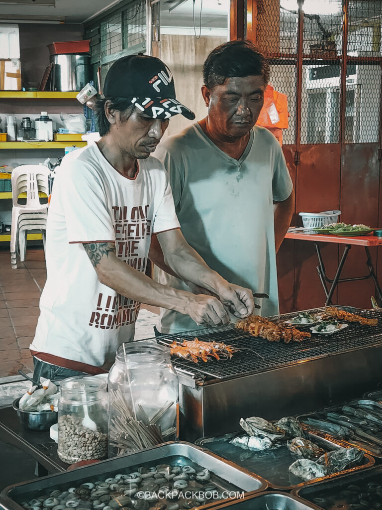 Tow Malaysia Chefs cook sea food at jonkers Jonkers Street Market | Jonkers Street Weekend Market | Jonkers Street Night Market | Jonkers Street Market in Melaka