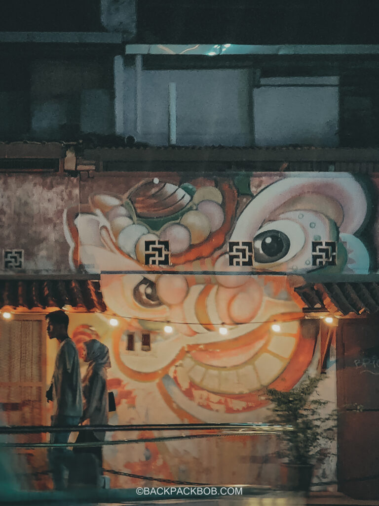 Melaka river cruise scary nighttime clown graffiti street art melaka