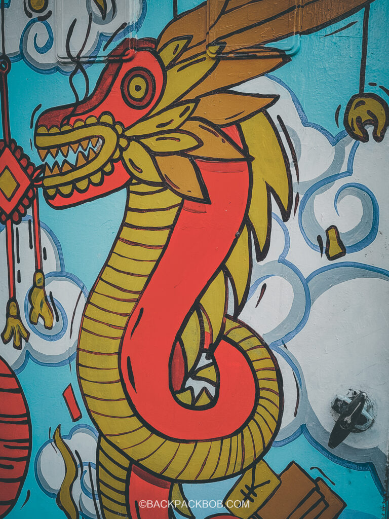 Free Street Art on the wall of Petaling Street Market in Kuala Lumpur