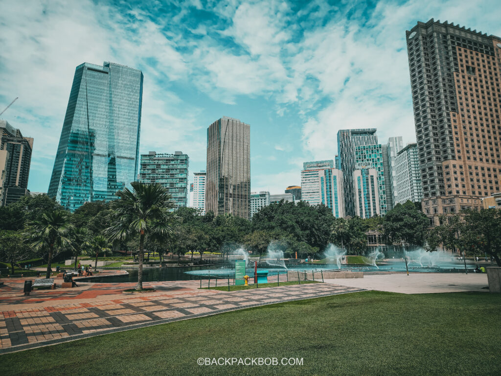 A photo of the symphony fountain show during one daytime of Malaysia itinerary at KLCC Park