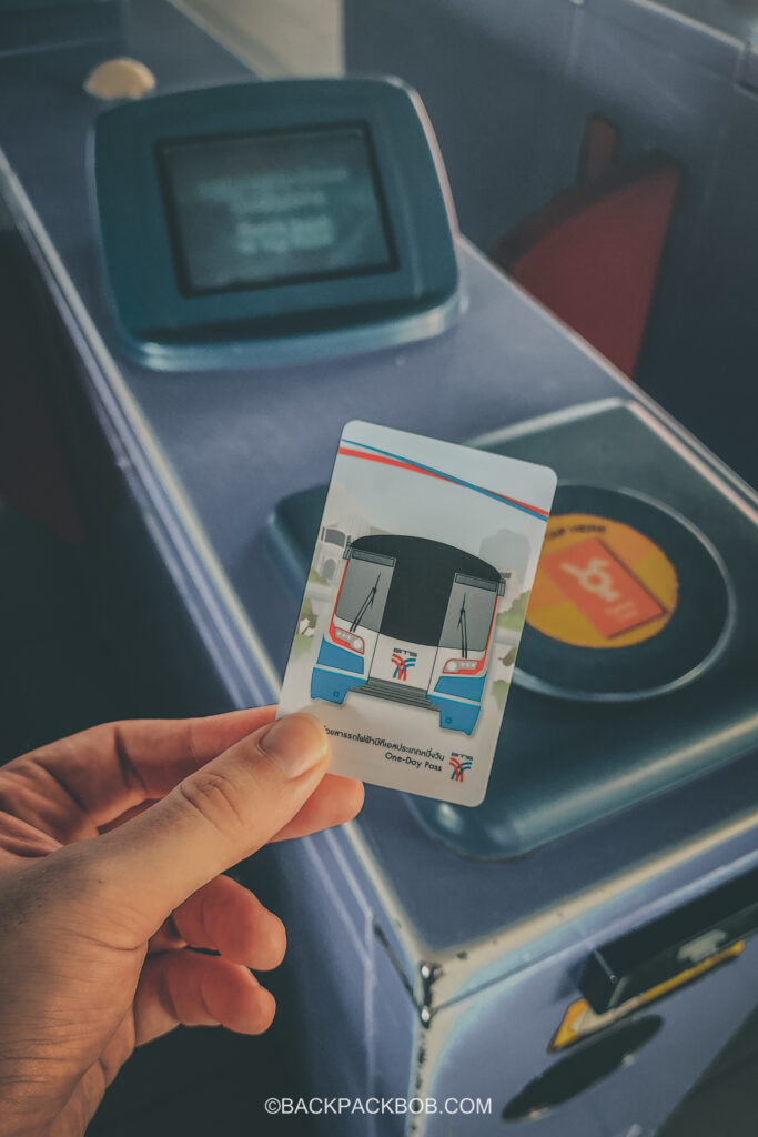 How to use the BTS Skytrain tickets a photo shows a Skytrain Passenger taping a ticket to enter the train. You’ll need to tap it on the touchpad, at the ticket barriers, in order to enter the station and access the platforms.