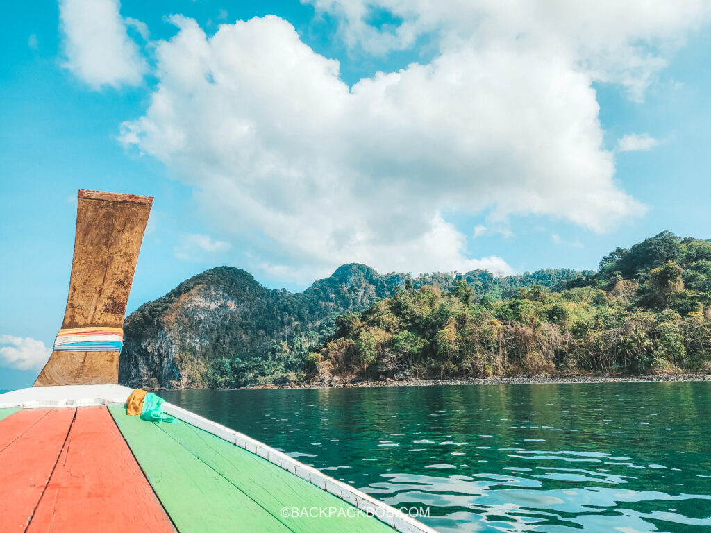 Taking a private longtail boat tour from Pawapi Beach Resort in Koh Mook to the Emerald Cave