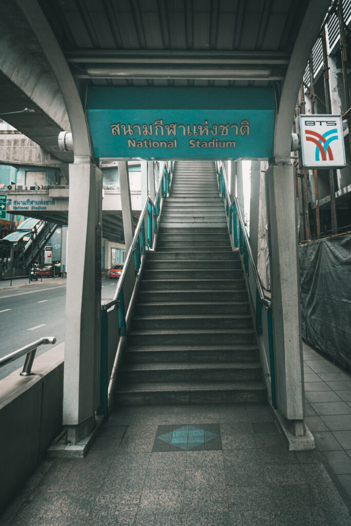 Archway entrance and BTS Skytrain sign entrance to BTS National Stadium Entrance