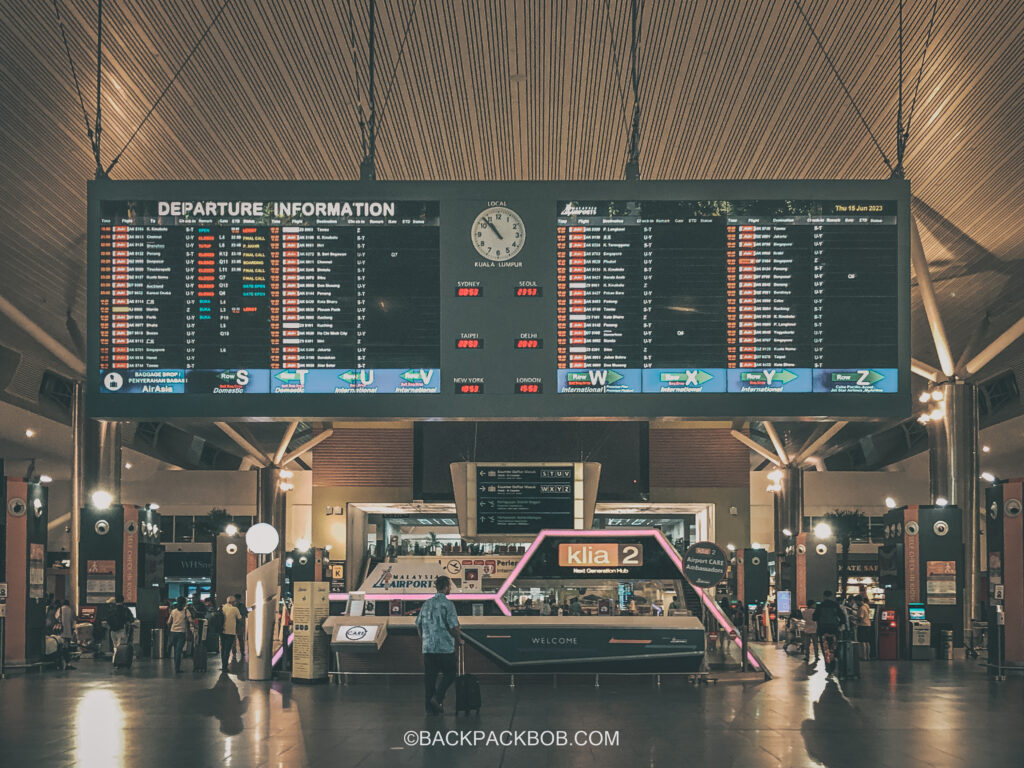 A departure board a Kuala Lumpur KLIA Airport showing the cheapest flights and departures at the airport