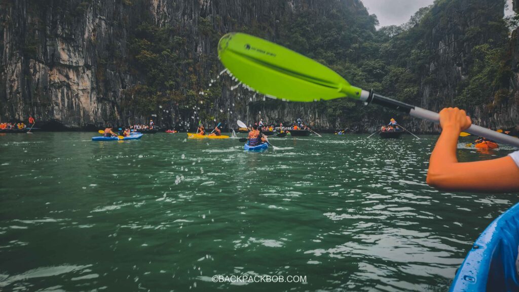 kayaking in Ha Long Bay on a boat cruise tour