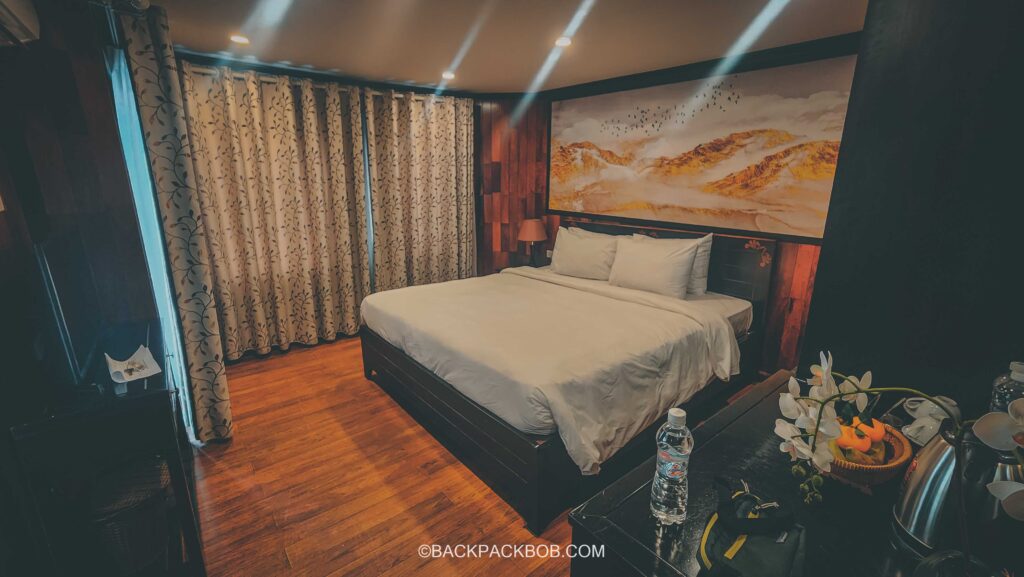 typical bedreoom on a 5 star overnight ha long bay boat cruise