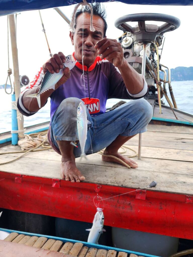 caught fish thailand boat captain longtail